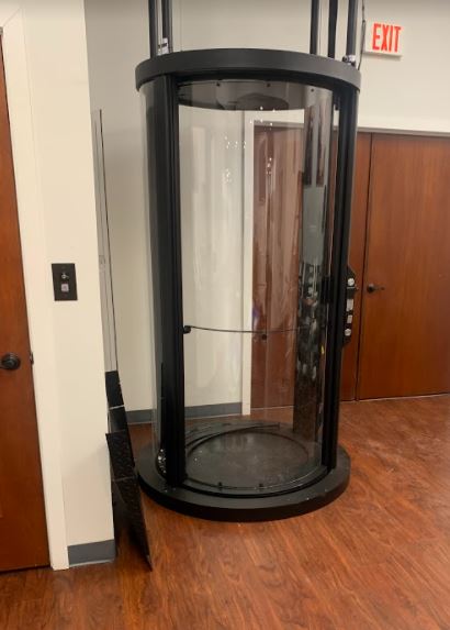 Vuelift glass elevator in Lifeway Chicago remodeled showroom in Arlington Heights, IL